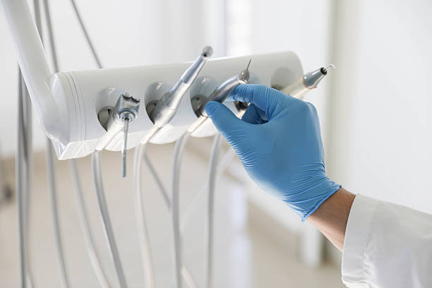 Professional Tooth Extraction technician working in Fountainebleau, FL
